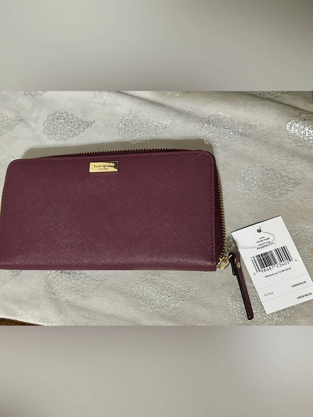 kate spade Plum Zip-Around Saffiano Wallet with Gold Plate